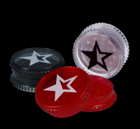 Three plastic containers with star designs 
